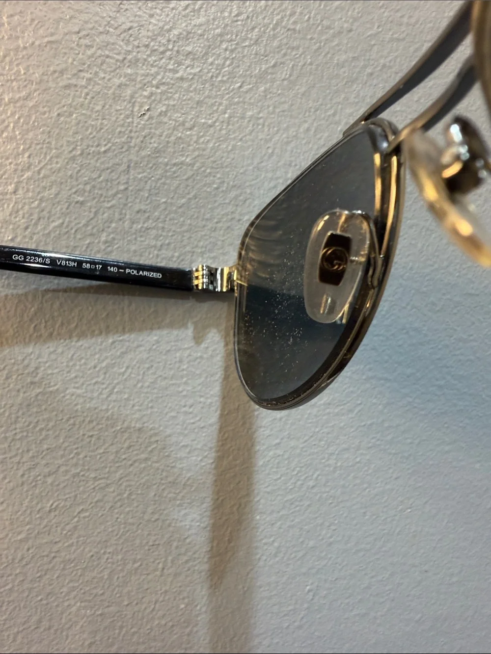Gucci Men's Black Oval Sunglasses with Silver Accents